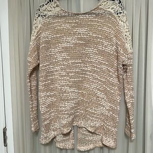 Cute sweater with back opening size large